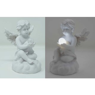 sitzender Engel mit Glitzerkugel in der Hand mit LED Beleuchtung